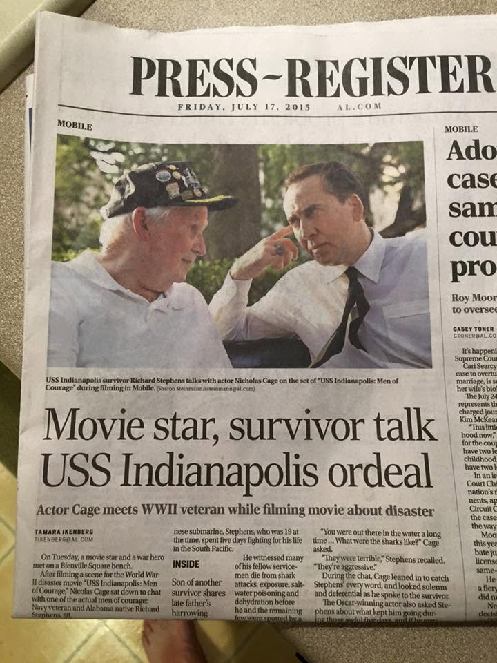 Press-Register newspaper front page featuring actor Nicolas Cage meeting a USS Indianapolis survivor during filming in Mobile